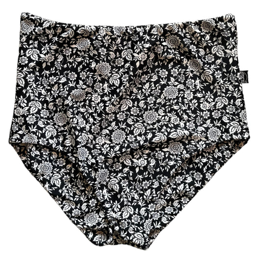 Calzón tiro alto regular bikini negro mini flores blancas