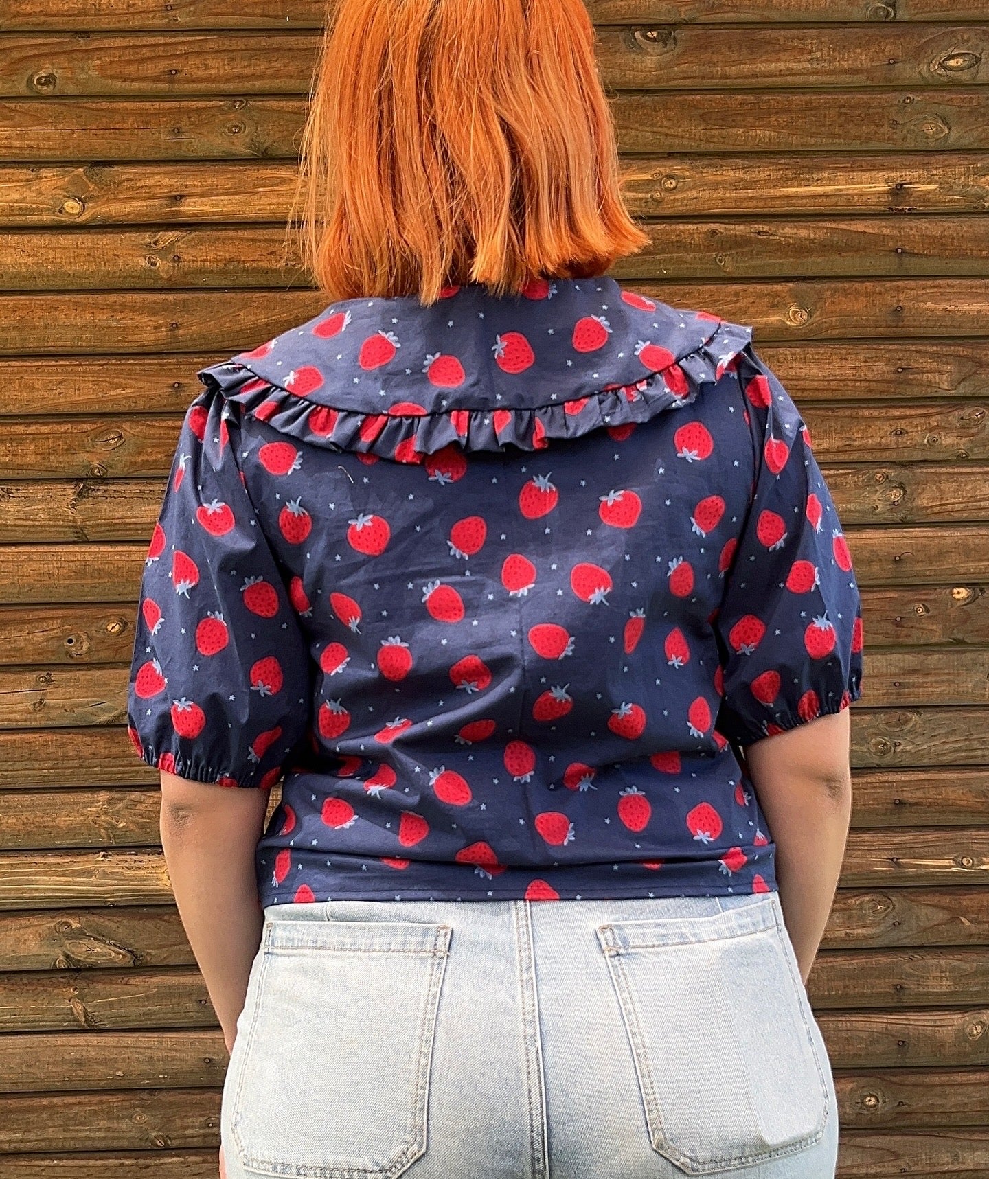 Blusa Tuttie azul frutillas