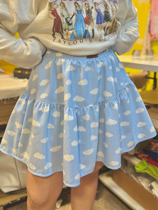 Mini falda Maya celeste nubes