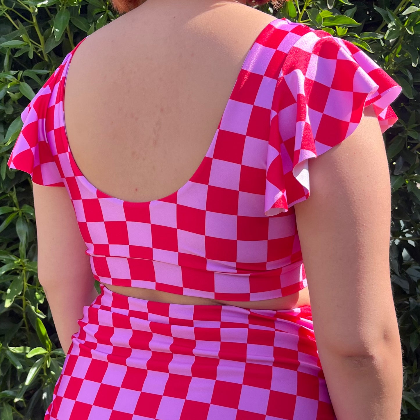 Top Flo chess rojo/rosado